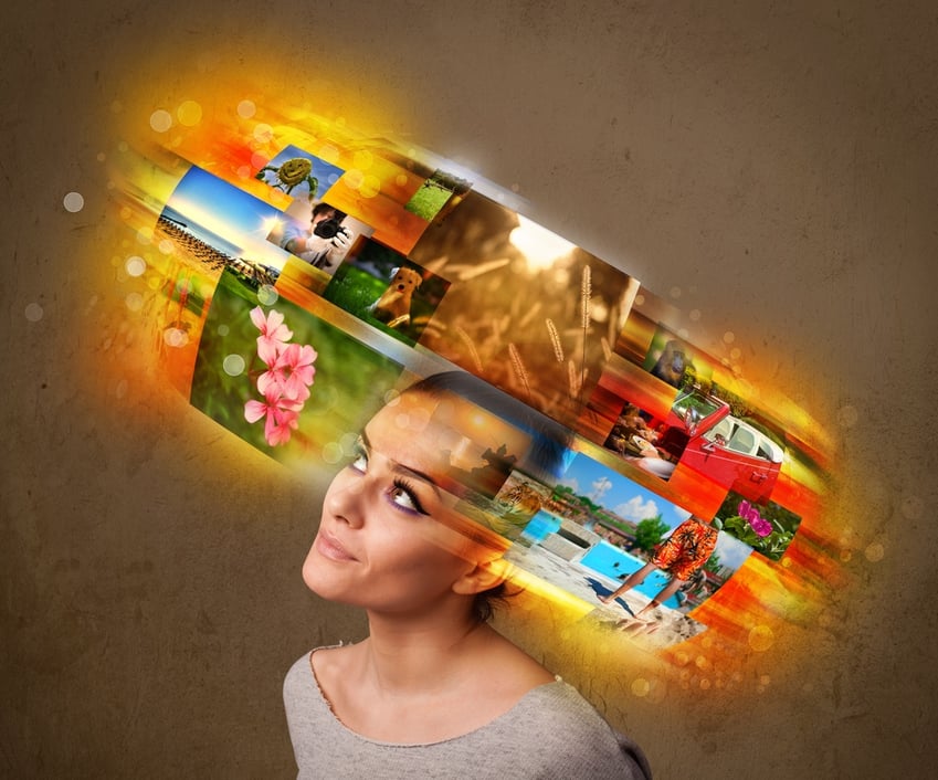 Cute girl with colorful glowing photo memories concept.jpeg
